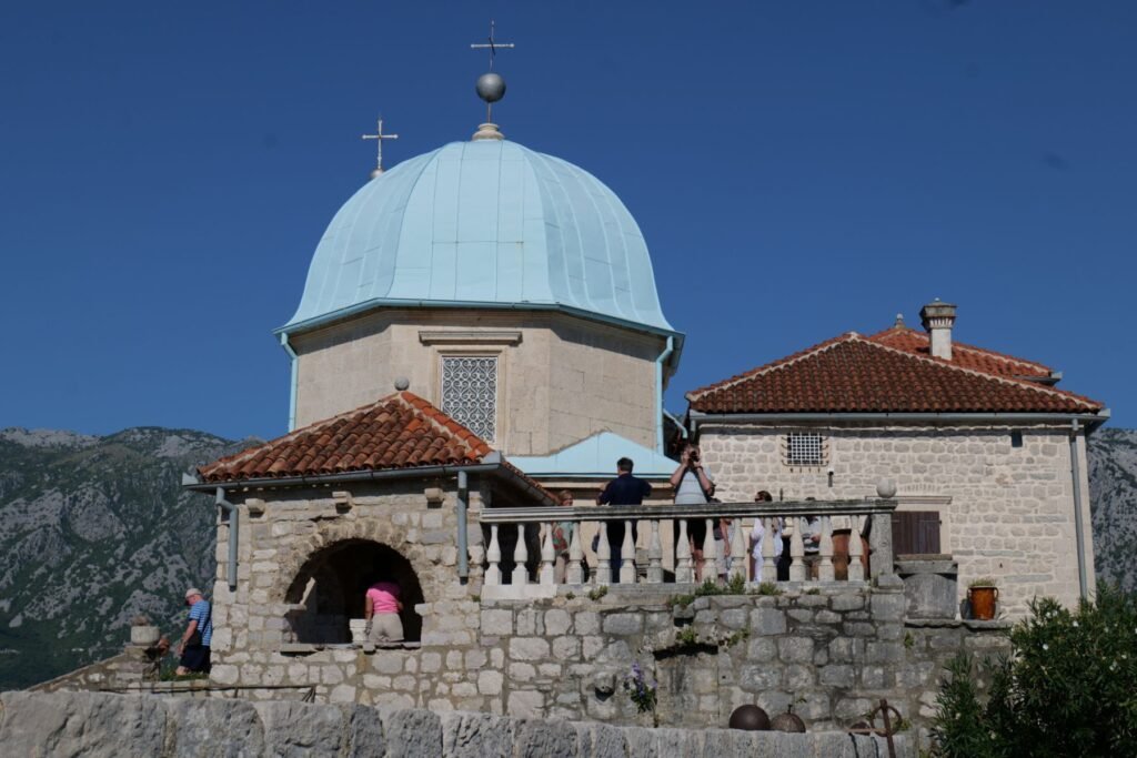 Montenegro's unique island church shines in brilliant baby blue!