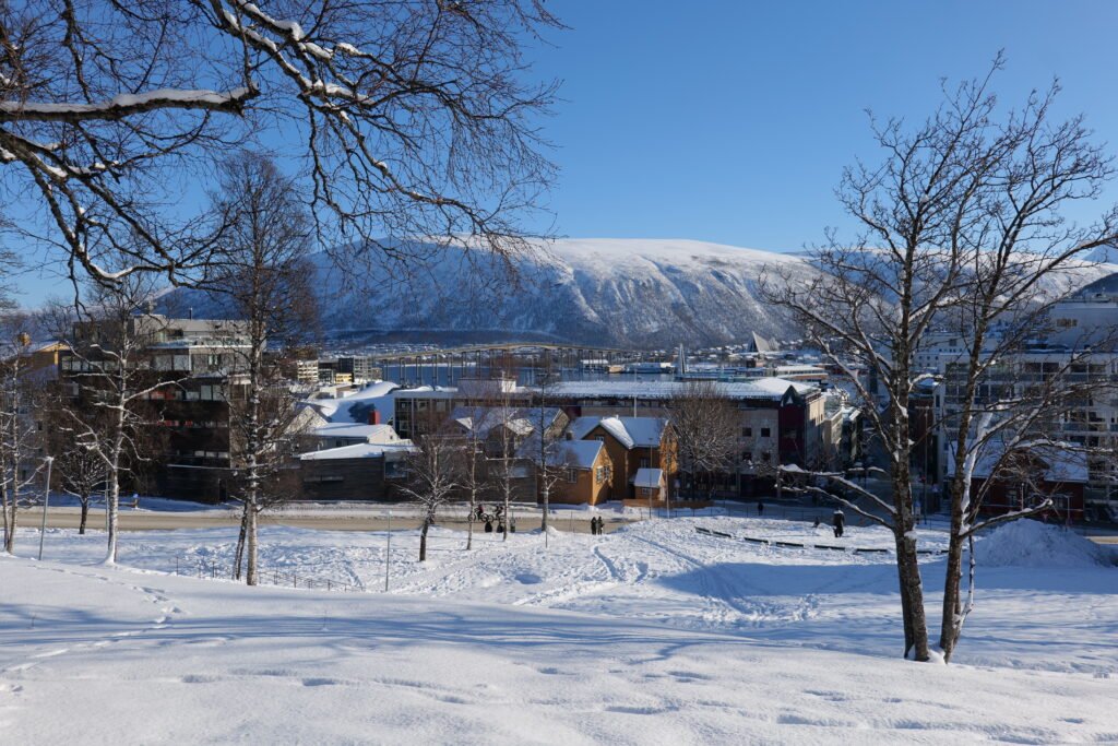One of my biggest solo female travel mistakes? Booking a hotel that required climbing an icy hill in Tromso!