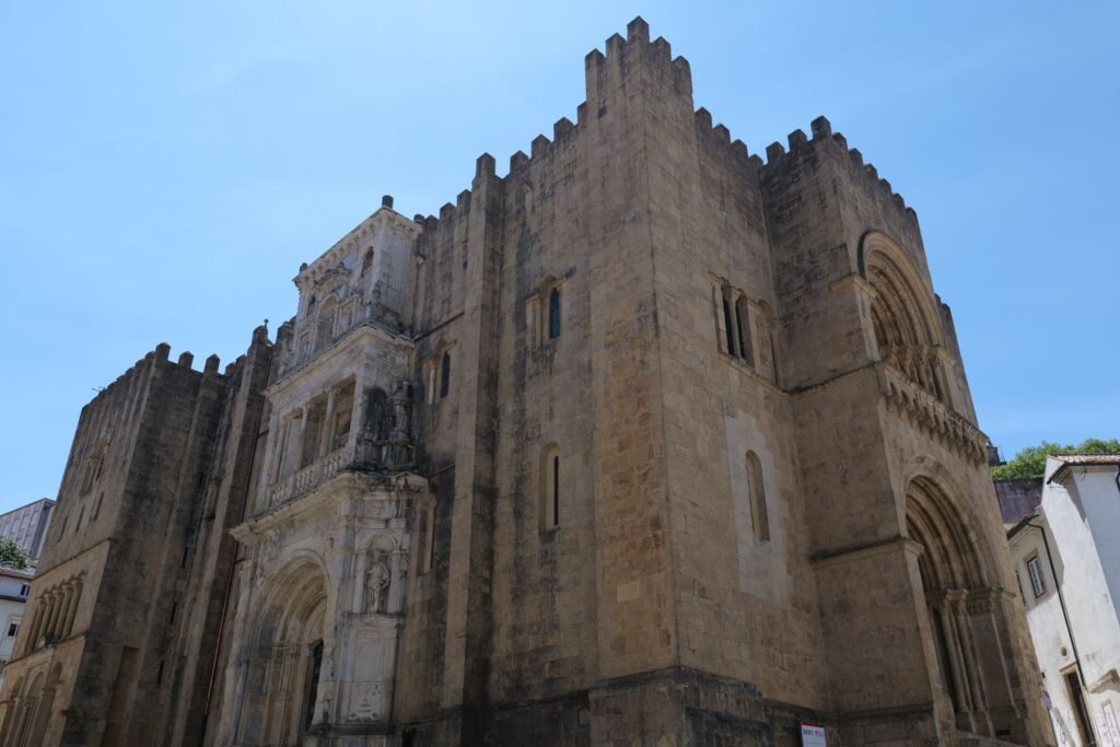 Admiring Coimbra's towering cathedral, in the heart of the old town!
