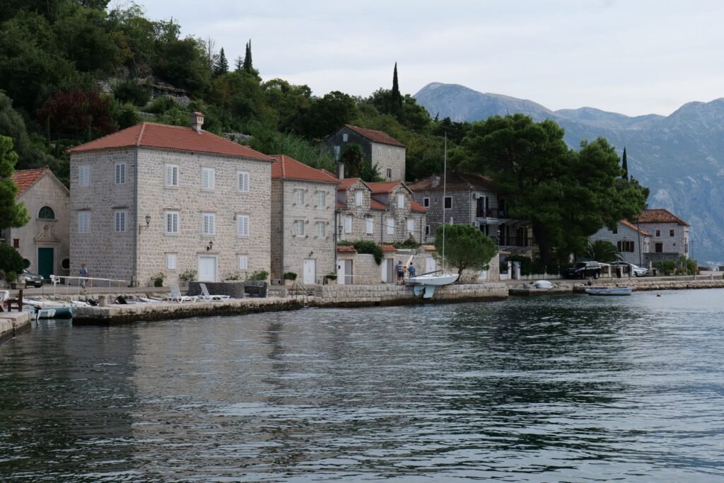 Perast waterfront is lined with so many beautiful palaces!