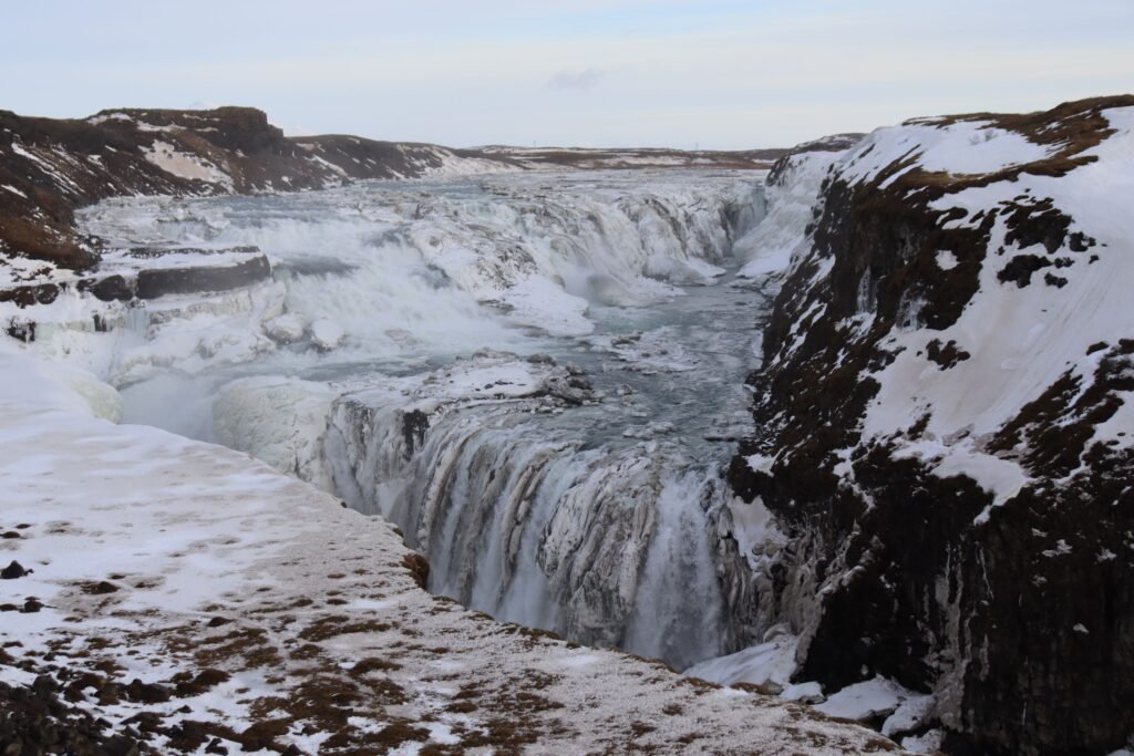 Visiting the stunning Gullfoss waterfall as part of a guided tour