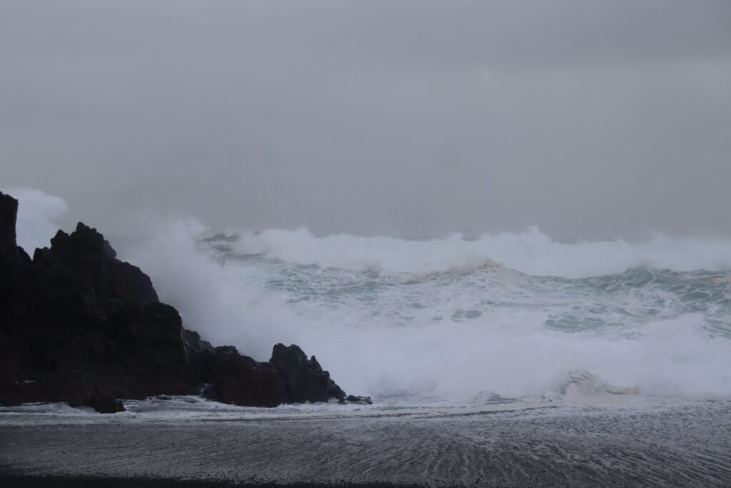 Waves crashing along the Snaefellsnes Peninsula for a true look at Iceland's raw beauty!
