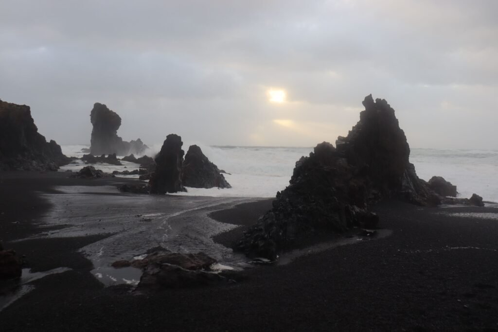 Watching the waves pound Djúpalónssandur Beach in winter!