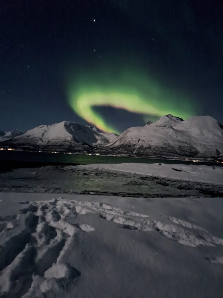 Watching the Northern Lights from our makeshift camp in the snow!
