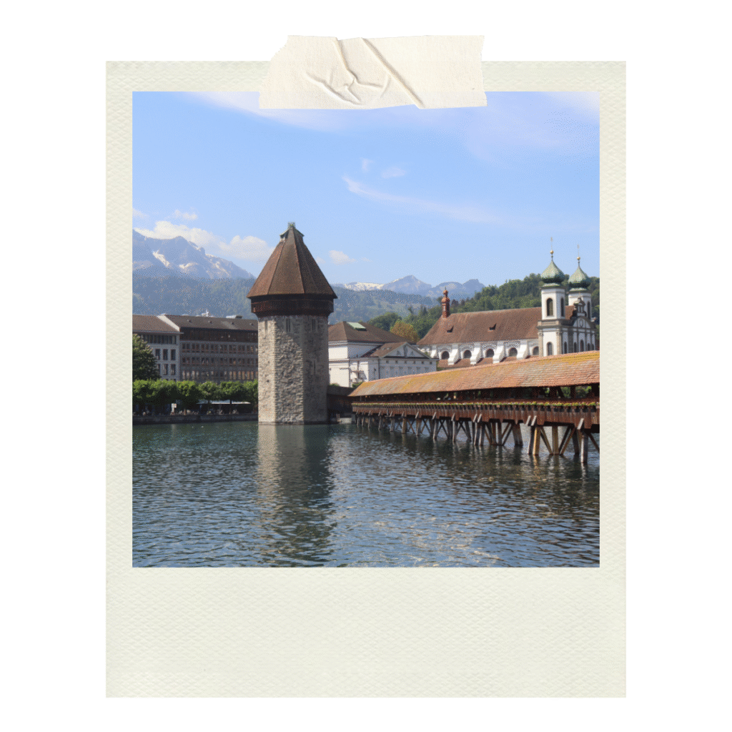 Lucerne with its famous bridge, stunning lake and a backdrop of mountains!