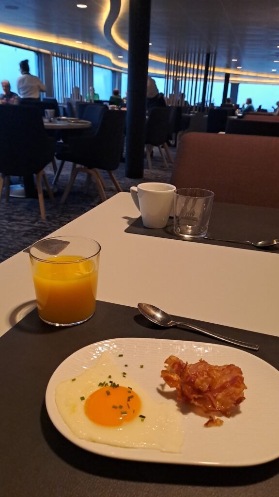 One of the delicious small plates of egg and bacon!