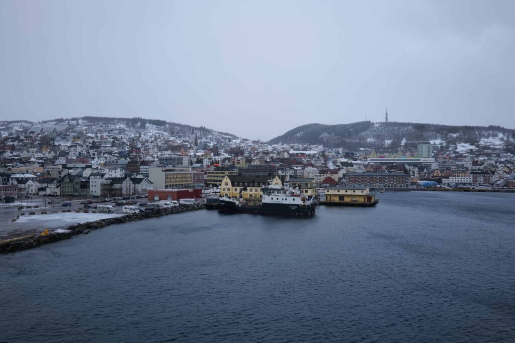 Revisiting the port city of Harstad on the southbound voyage