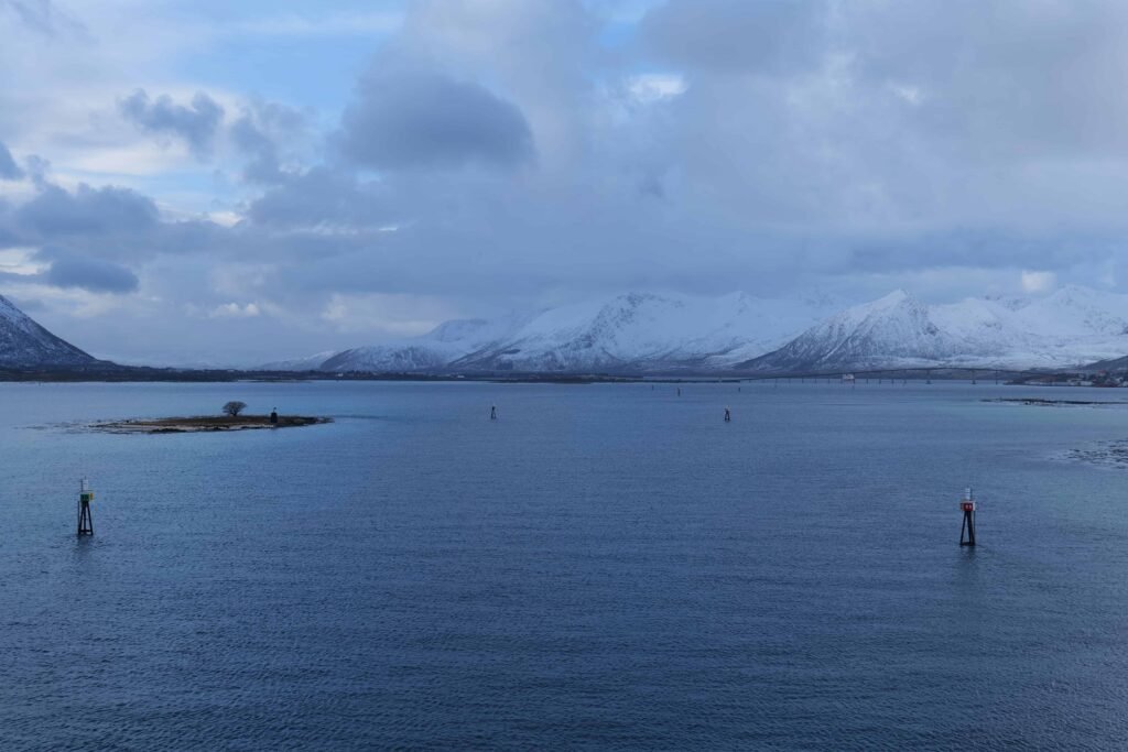 Our captain expertly navigating the ship through the narrow Risøy Channel