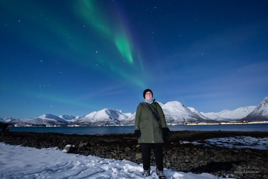 Another portrait of me under the Northern lights, all bundled up for the cold!