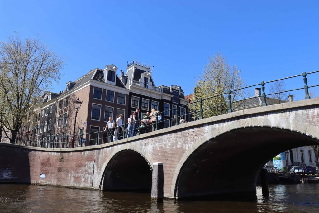 Passing under bridges on our open canal boat!