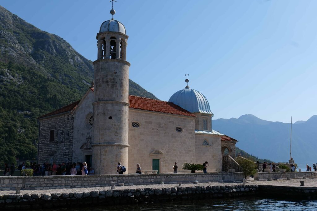 Pack a layer if you want to enter inside Our Lady of the Rocks island church