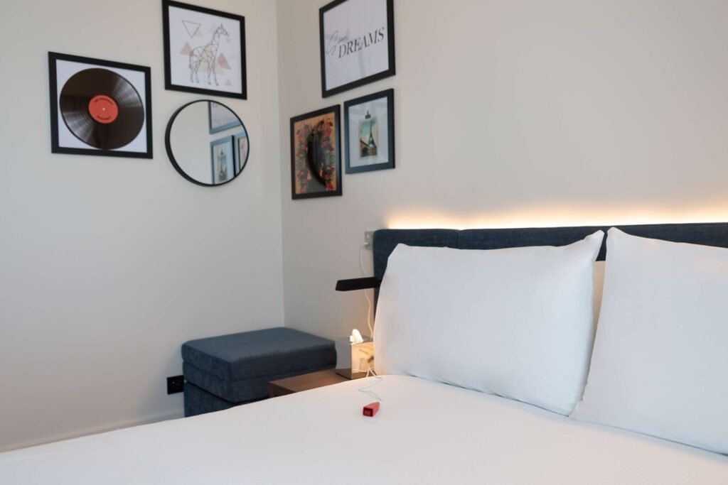 A modern, comfortable room at the Hampton by Hilton Ashford International.