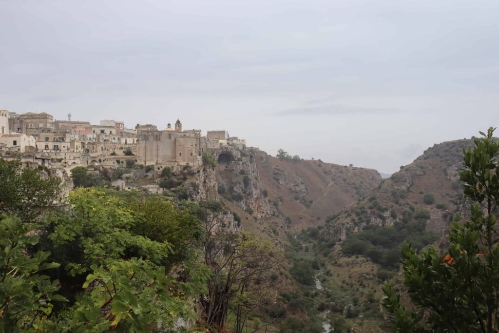 Historic village overlooking a scenic valley.