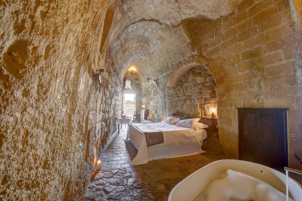 Stay inside a cave at Sextantio Le Grotte Della Civita! (Photo: Expedia)