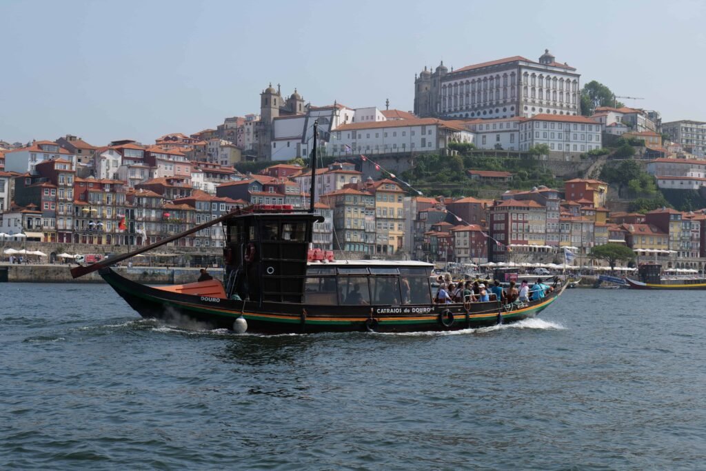 A traditional Rabelo boat on the water in Porto